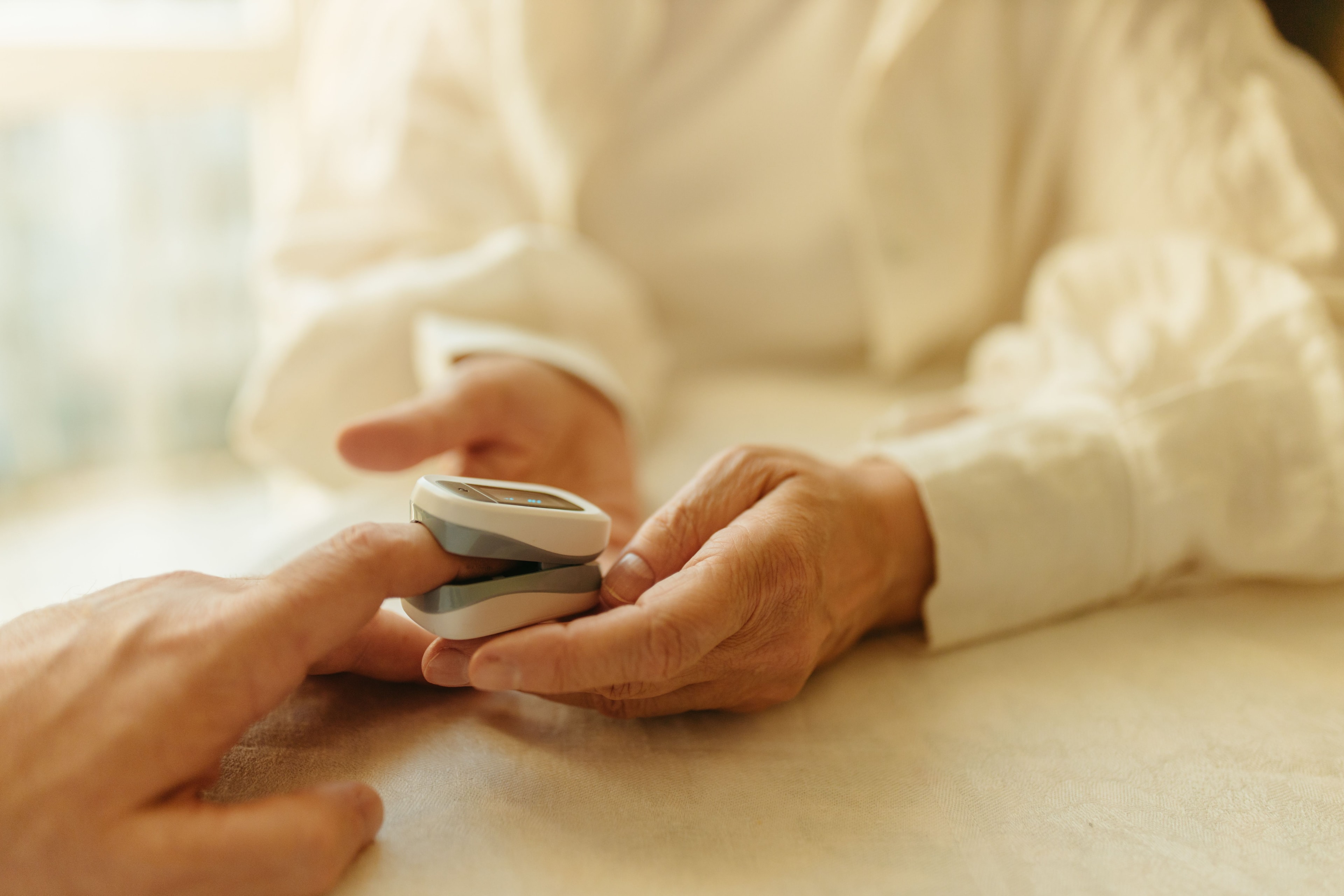 Caregiver providing attentive home health monitoring