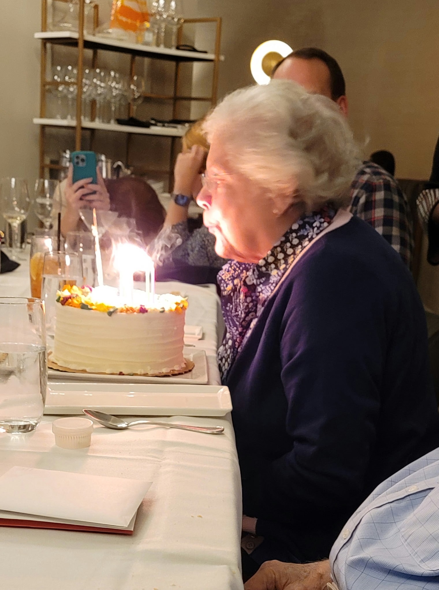 Client celebrating a birthday with candles — Peaceful Place Home Care, Matthews NC